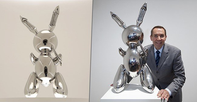 Jeff Koons posing with his $91 Million Rabbit Sculpture
