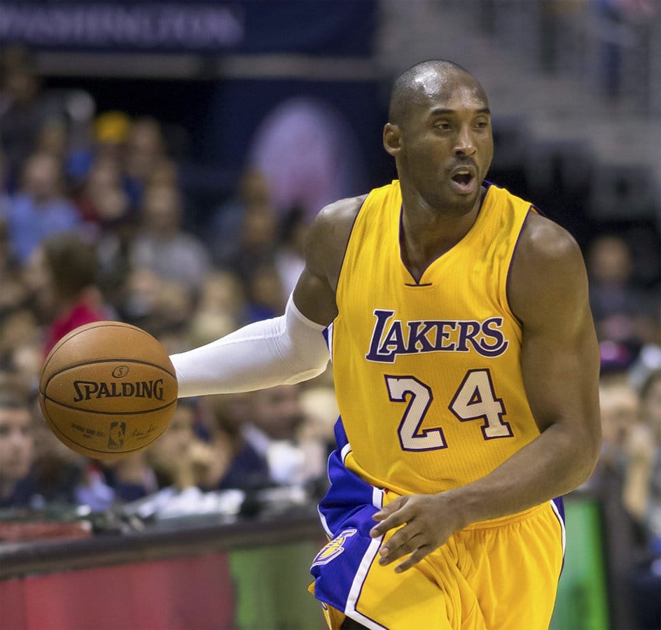 Kobe Bryant playing basketball for the Los Angeles Lakers