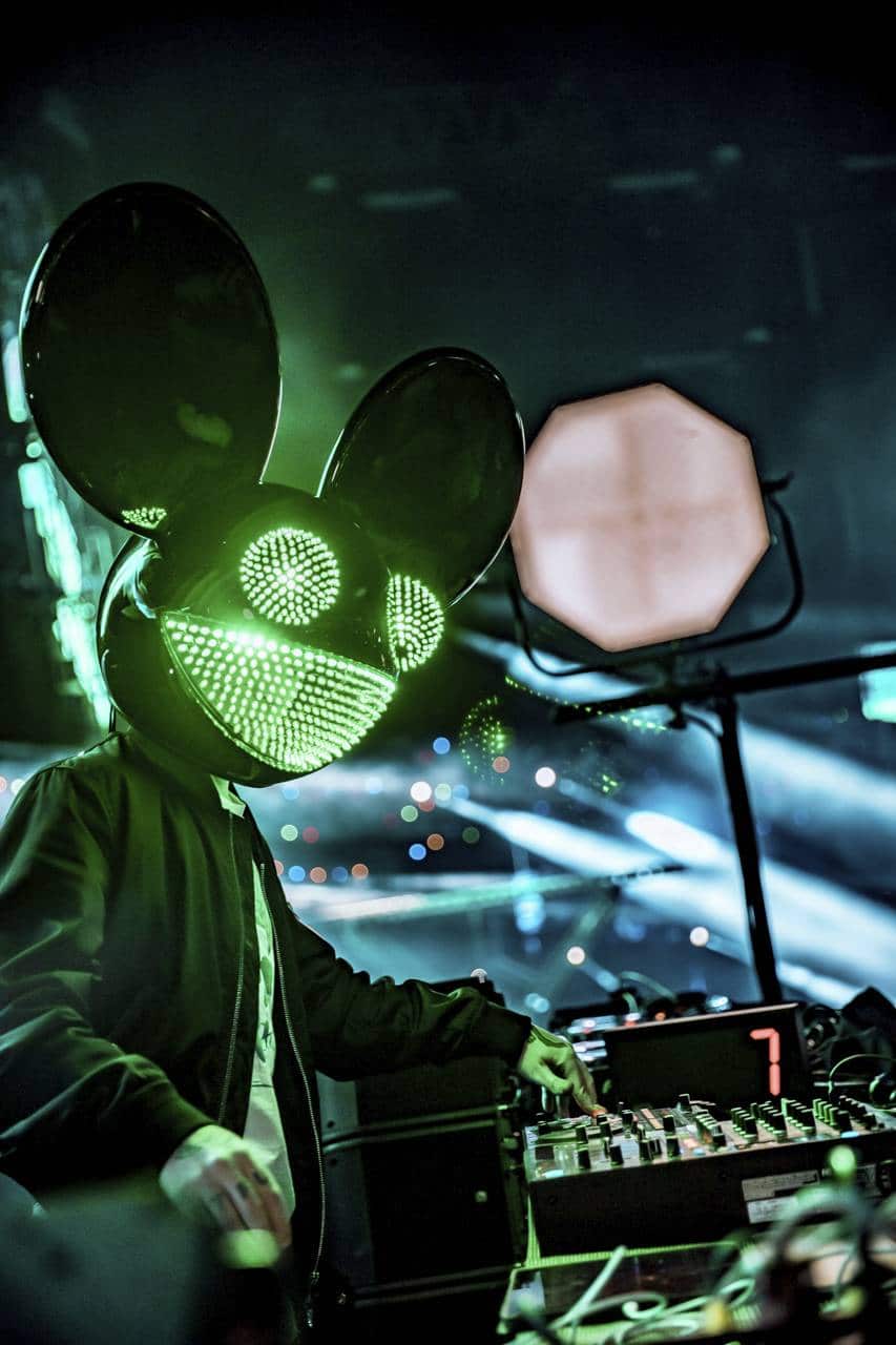 an image of Deadmau5 in his iconic mouse hat during as concert.