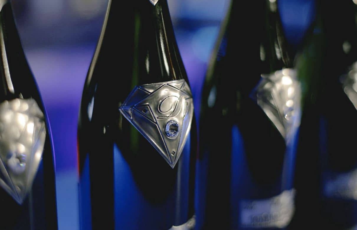 Image featuring several Goût de Diamants x SVS champagne bottles