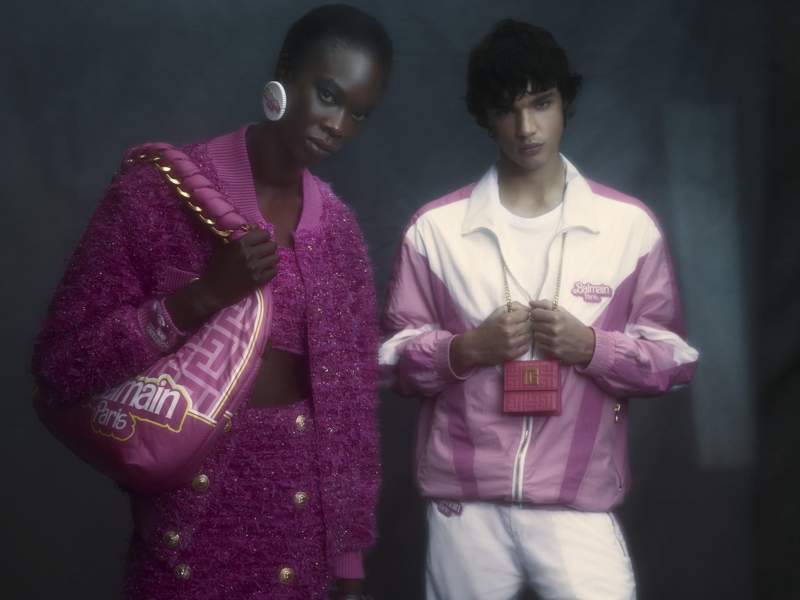 Photograph of two models wearing the clothes from the Barbie x Balmain collection