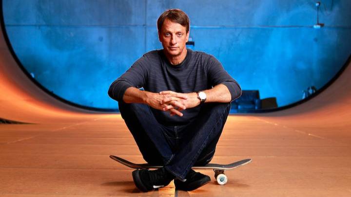 image of Skateboarding legend Tony Hawk sitting on a skateboard NFT