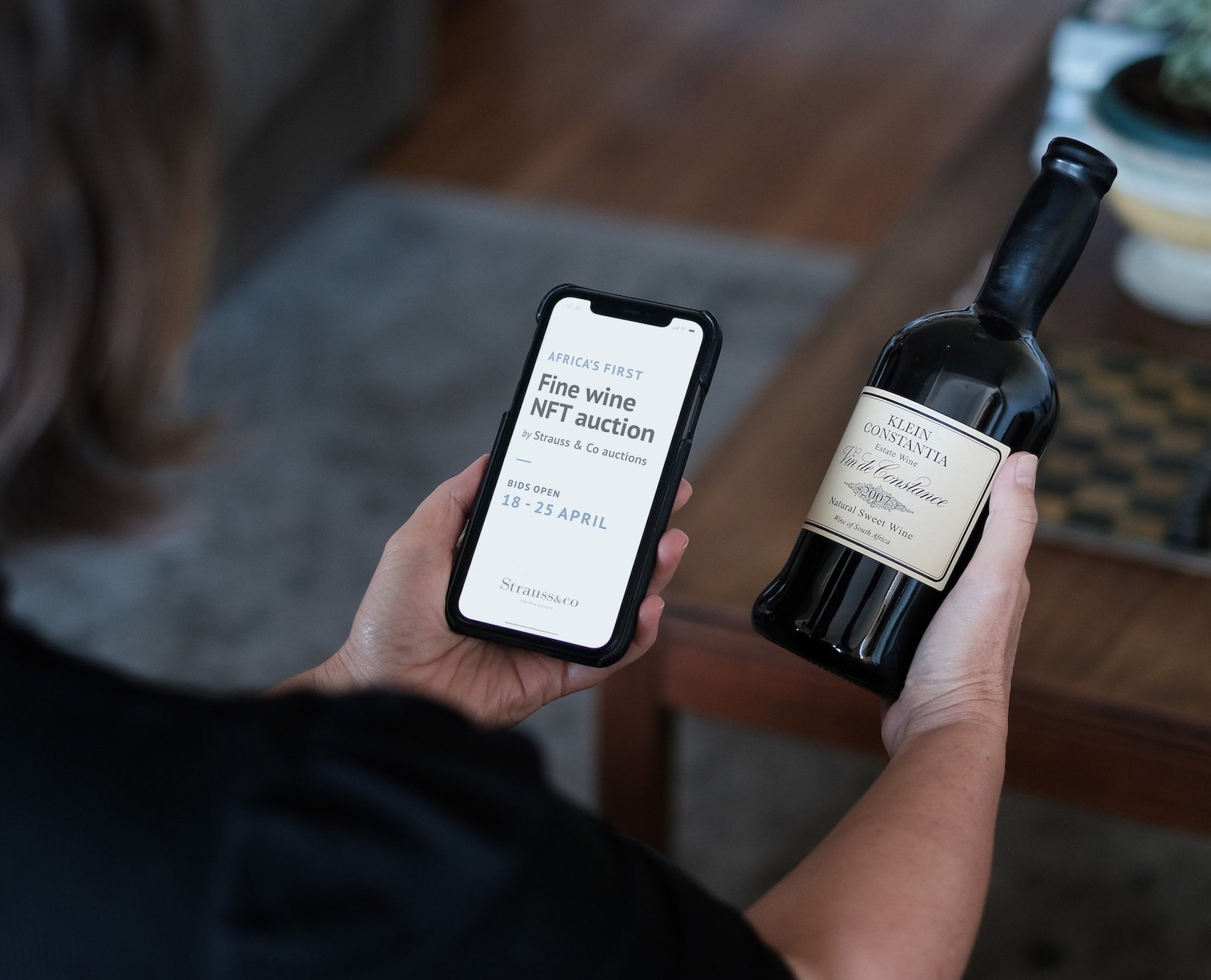 image of the Strauss & Co NFT fine wine auction on a mobile smartphone