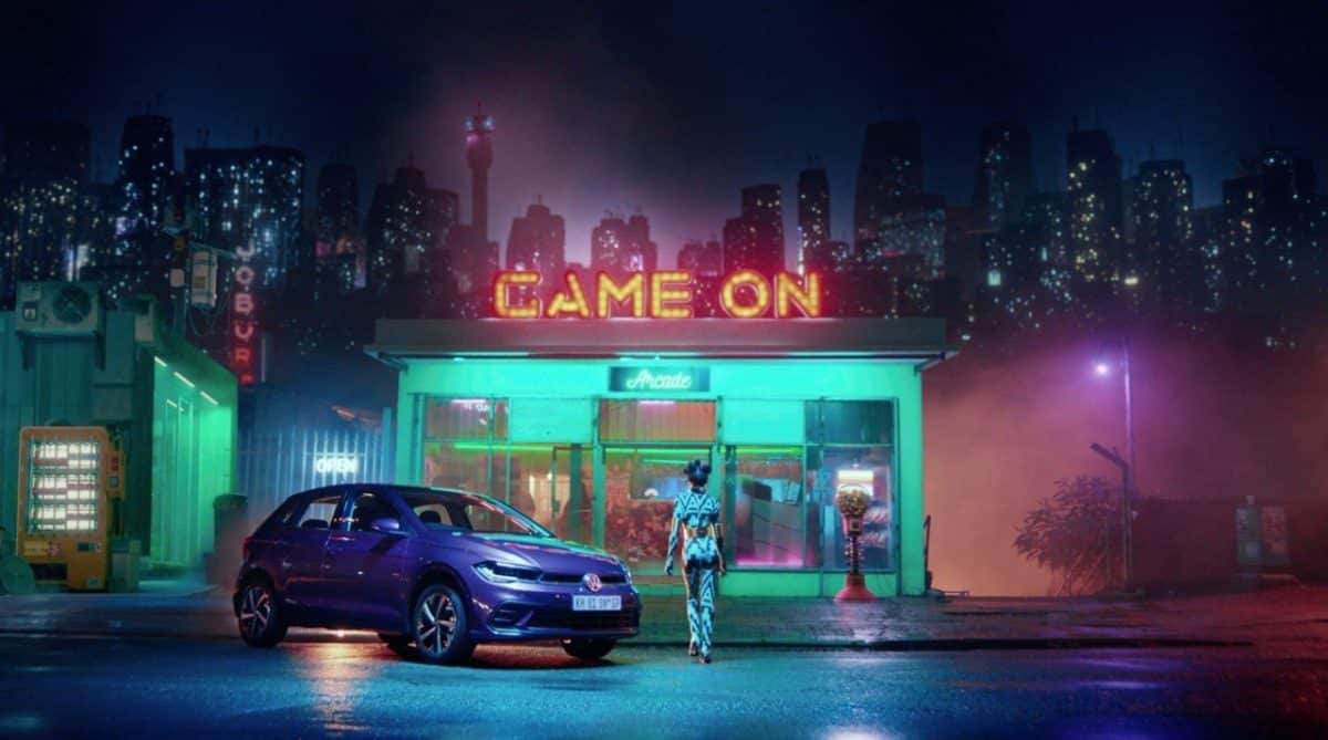 Image of the Volkswagen NFT metaverse treasure hunt, featuring bright lights, a car and the words GAME ON.