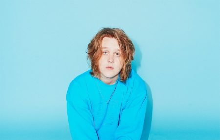 The picture shows singer-songwriter Lewis Capaldi who will play during a live DeFi-funded event