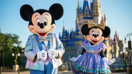 Image of Disney characters Mickey and Minnie mouse outside the resort metaverse