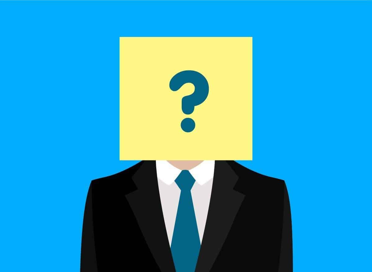 A digital image of a man in a suit with his face covered with a question mark