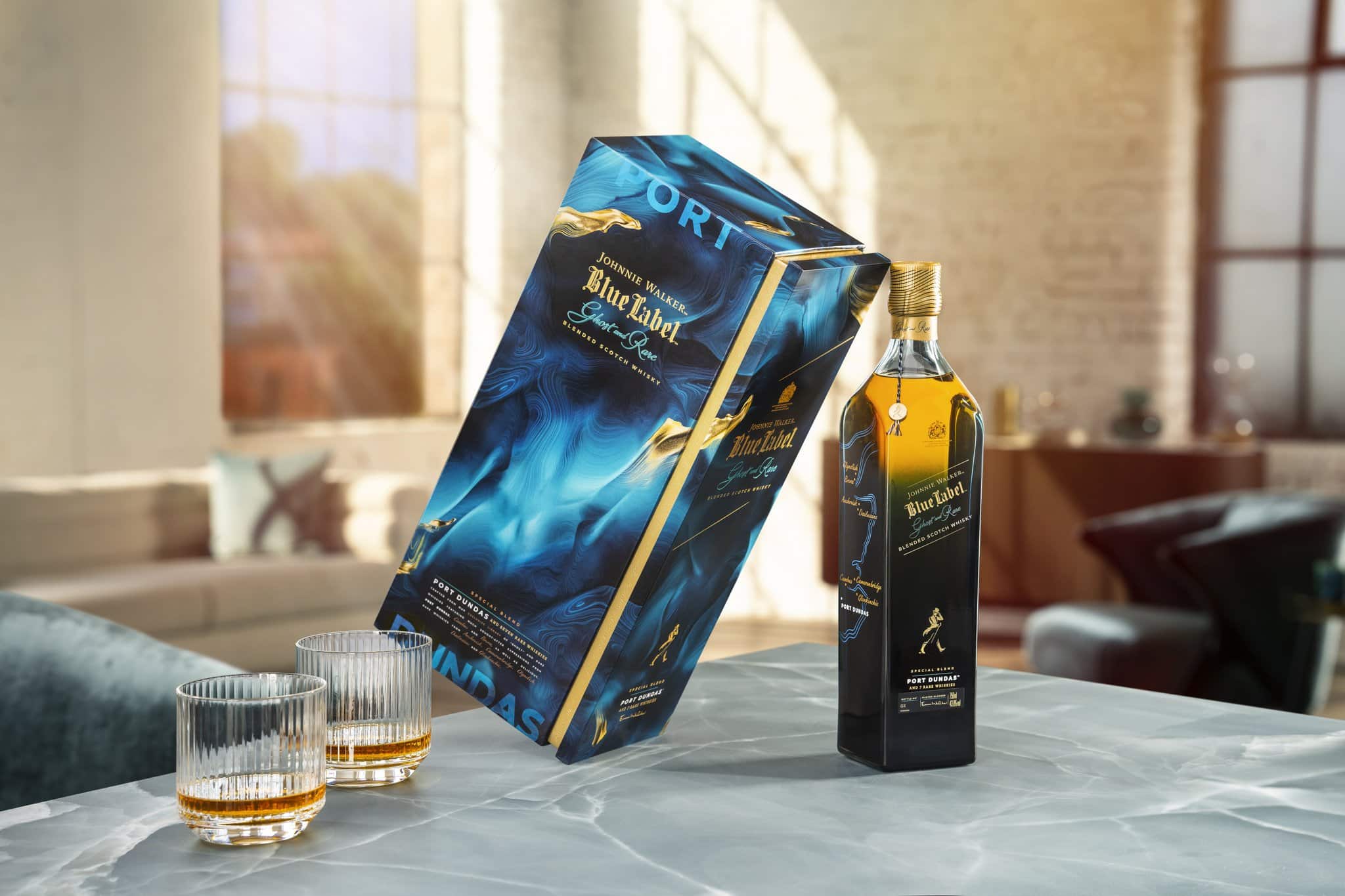 Photo of New Johnnie Walker Blue Label Whiskey with NFT on a table with sunbeams