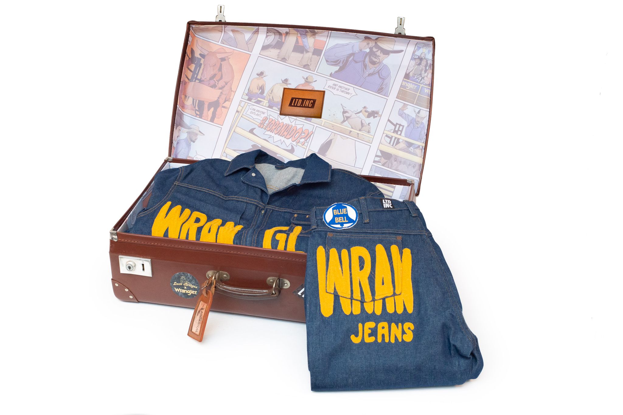 Image of Wrangler suit in a brown suitcase