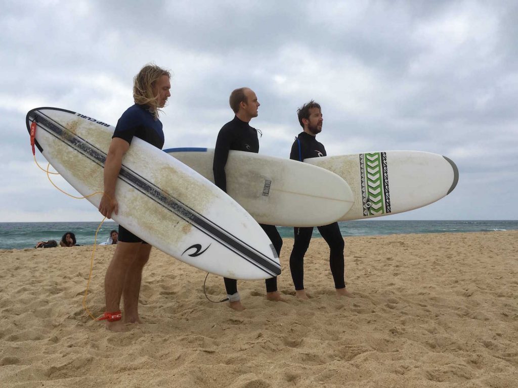 SuperRare founders with surfboards