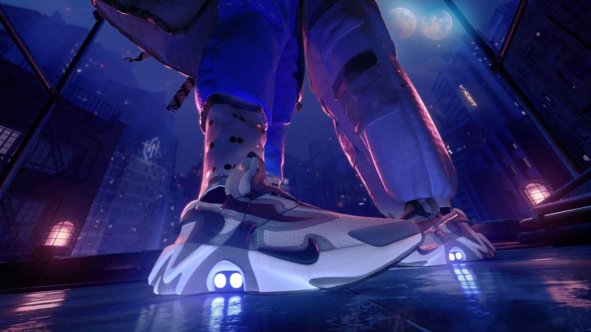 A pair of white Nike sneakers on a dancefloor in support of the Nike .SWOOSH platform.