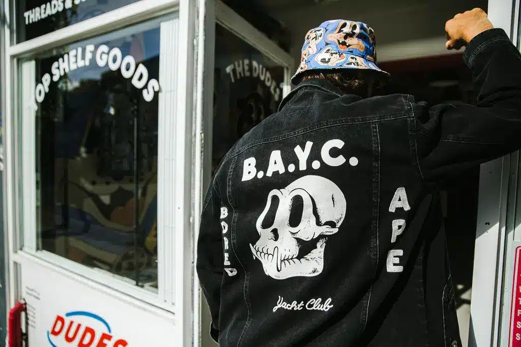 a person wearing a BAYCE hoodie apefest 2023 