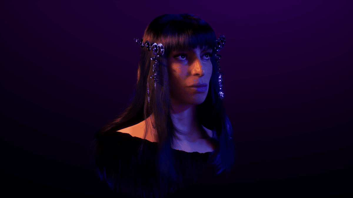 portrait of musician Sevdaza sitting in the dark with a digital hair accessory on her head