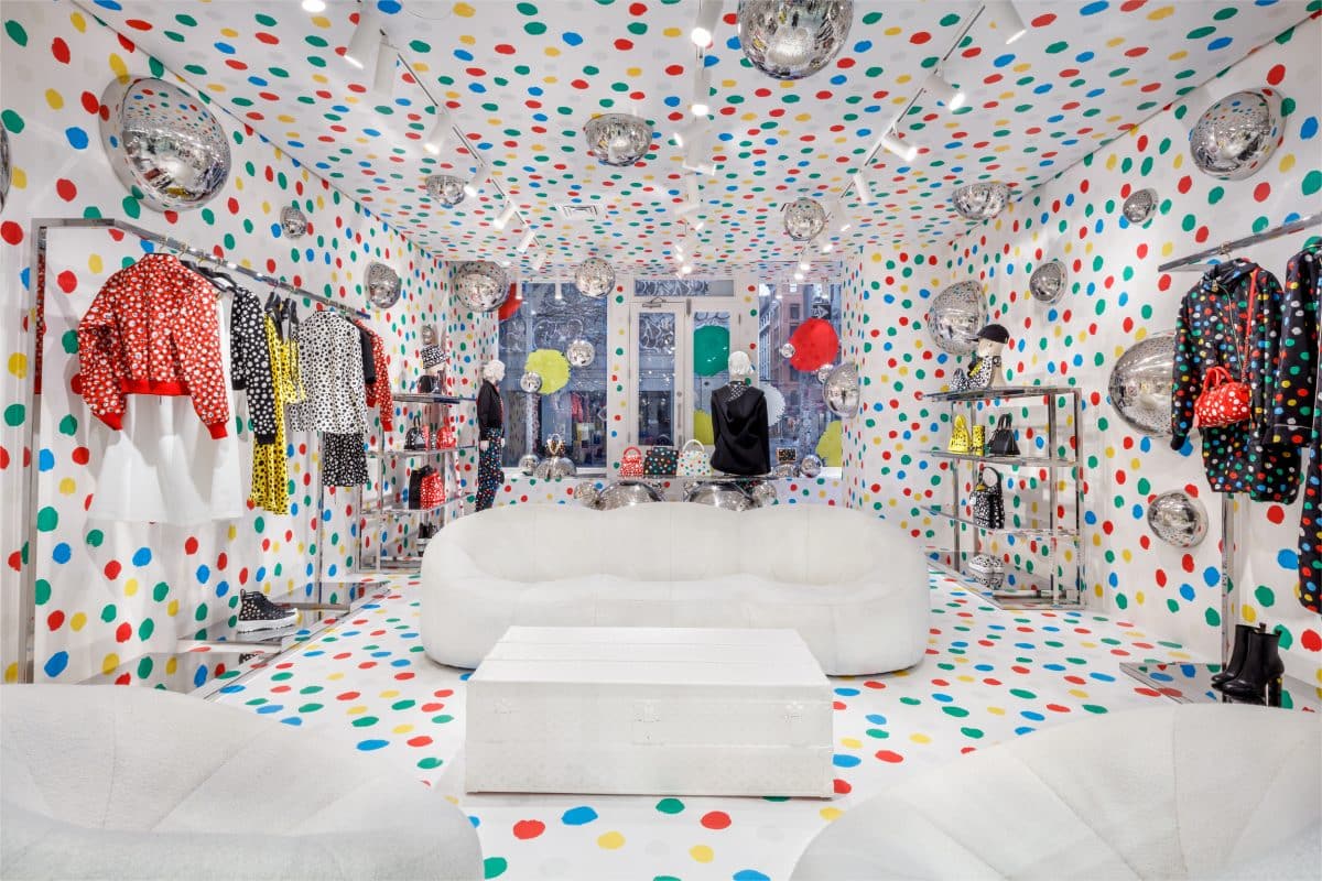 A Louis Vuitton store is painted with polka dots.