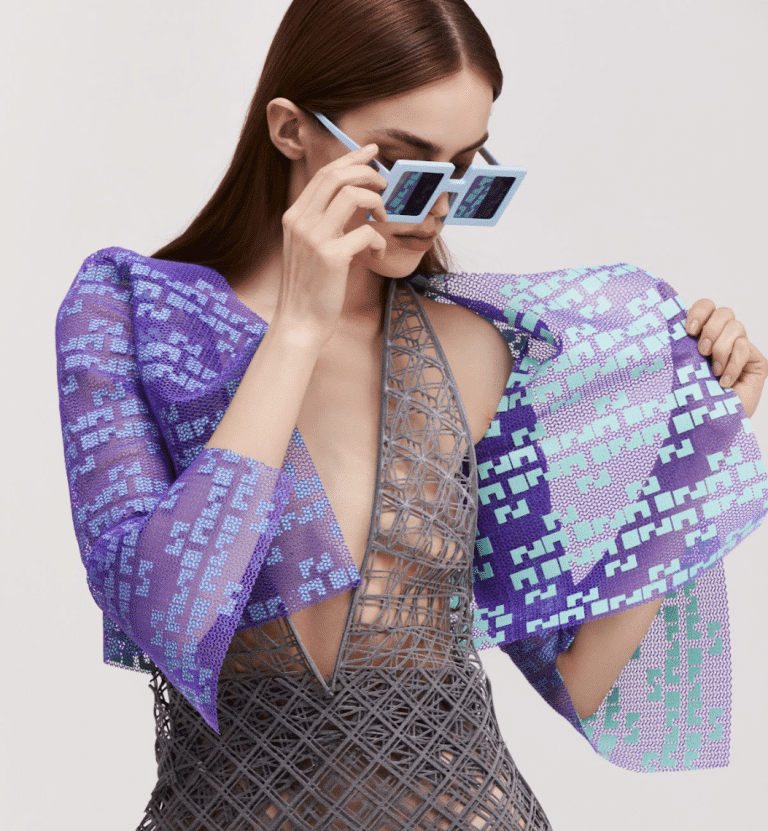 a woman wearing 3D-printed fashion funded by Nouns DAO