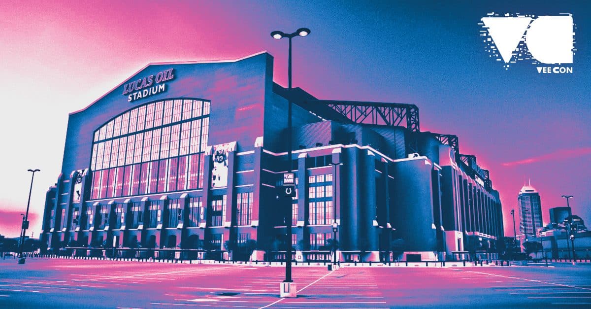 a stylized image of the Lucas Oil Stadium, where Veecon 2023 is set to take place