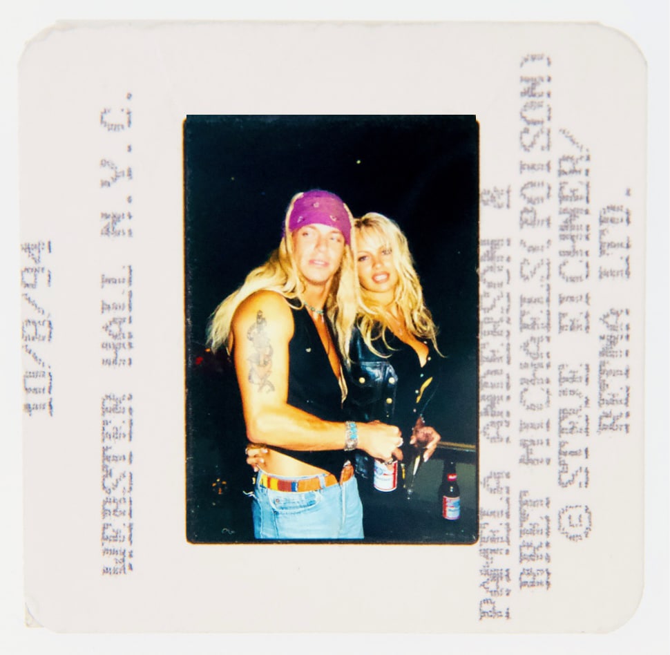 Photo from OneOf showing Pamela Anderson partying with Bret Michaels