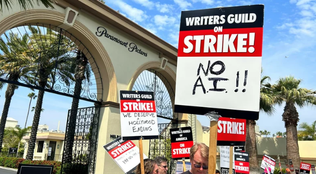 image of entertainment employees on strike against AI